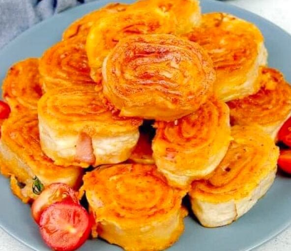 "Mulini a Vento Fritti: La Ricetta Gustosa che Sorprenderà i Tuoi Ospiti!"